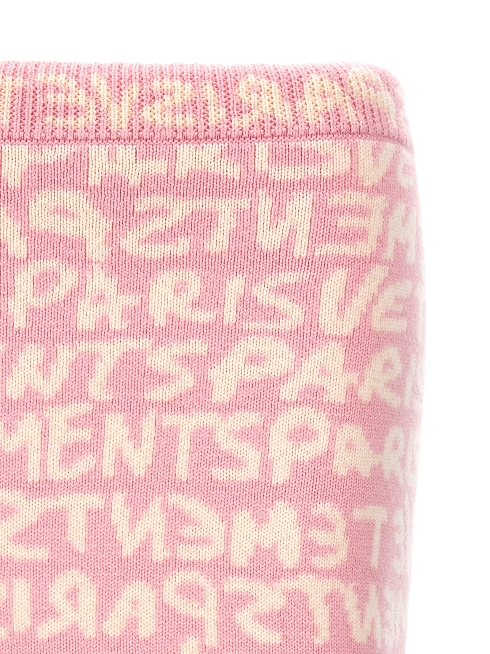 Skirt by Vetements for women in merino wool multicolor, pink, patterned, jacquard & monogram showcases a sultry silhouette, elegantly defined by its maxi long and the sophisticated sultry design of the Women's Merino Wool Maxi Long Skirt.