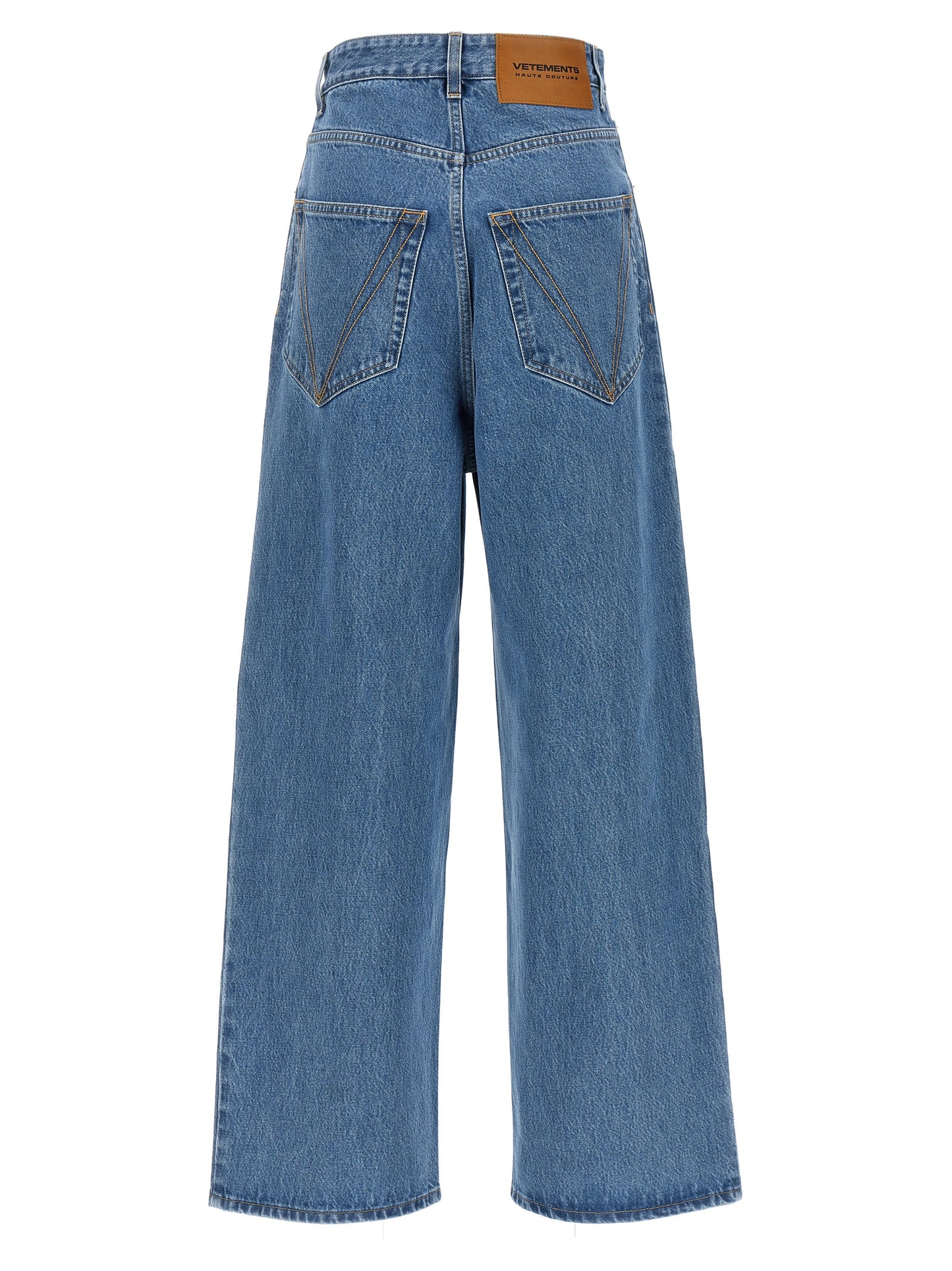 Jeans by Vetements for women in cotton denim blue features a polished silhouette with a polished straight-leg, relaxed-fit & wide, reaching a polished long and finished with a polished high rise.