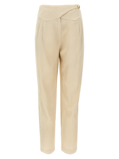 Trousers by Blazé Milano for women in viscose beige presents a perennial silhouette, meticulously tailored with a straight-leg cut, long finish, and an elegant high rise.