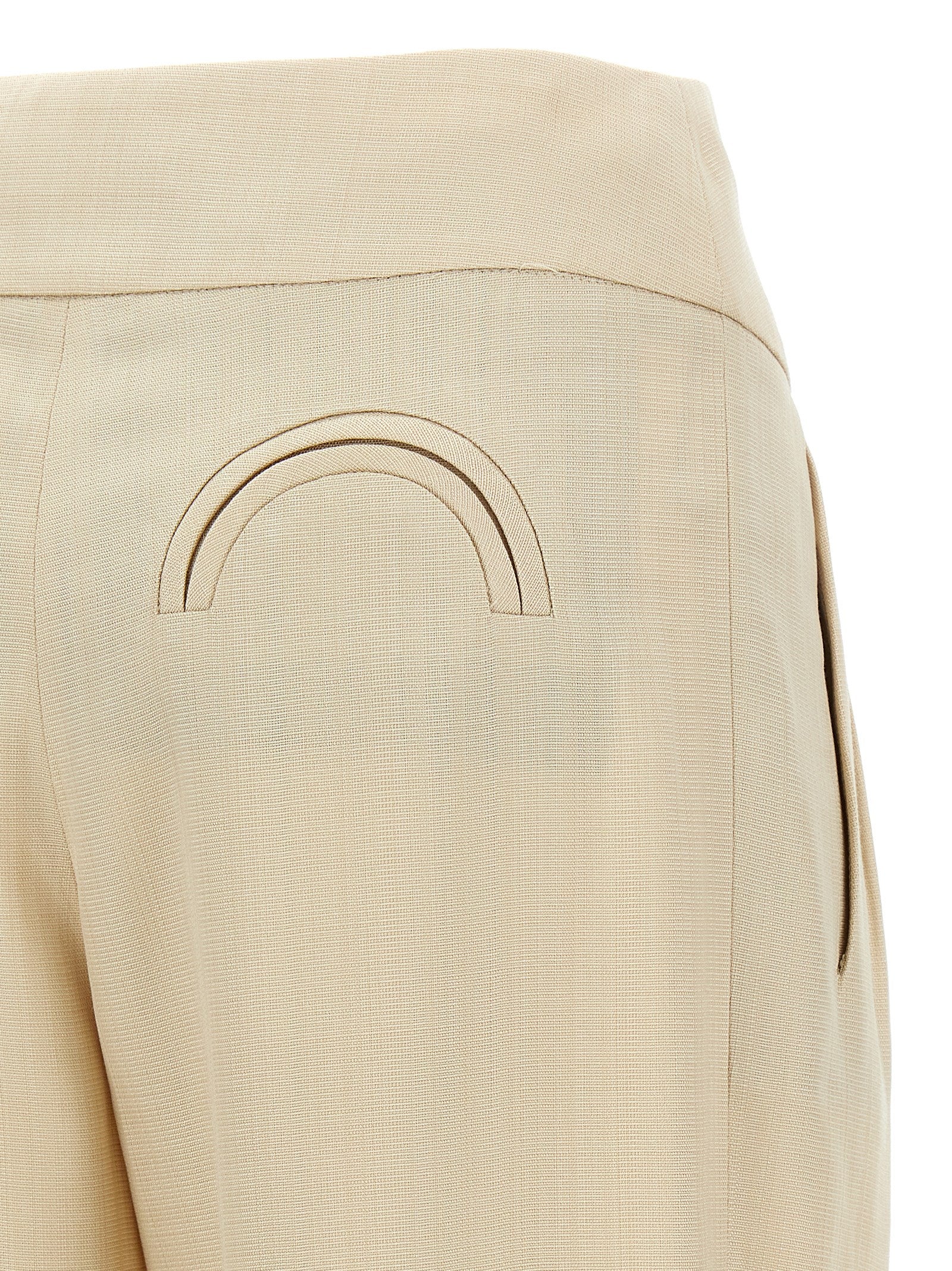 Trousers by Blazé Milano for women in viscose beige features a sculptural silhouette, showcasing a sculptural straight-leg and long with a sophisticated high rise for a sculptural finish.