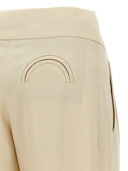 Trousers by Blazé Milano for women in viscose beige features a sculptural silhouette, showcasing a sculptural straight-leg and long with a sophisticated high rise for a sculptural finish.