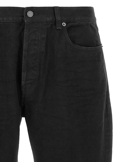 Jeans by Saint Laurent for men in cotton denim black features a polished silhouette with a polished straight-leg, reaching a polished long and finished with a polished .