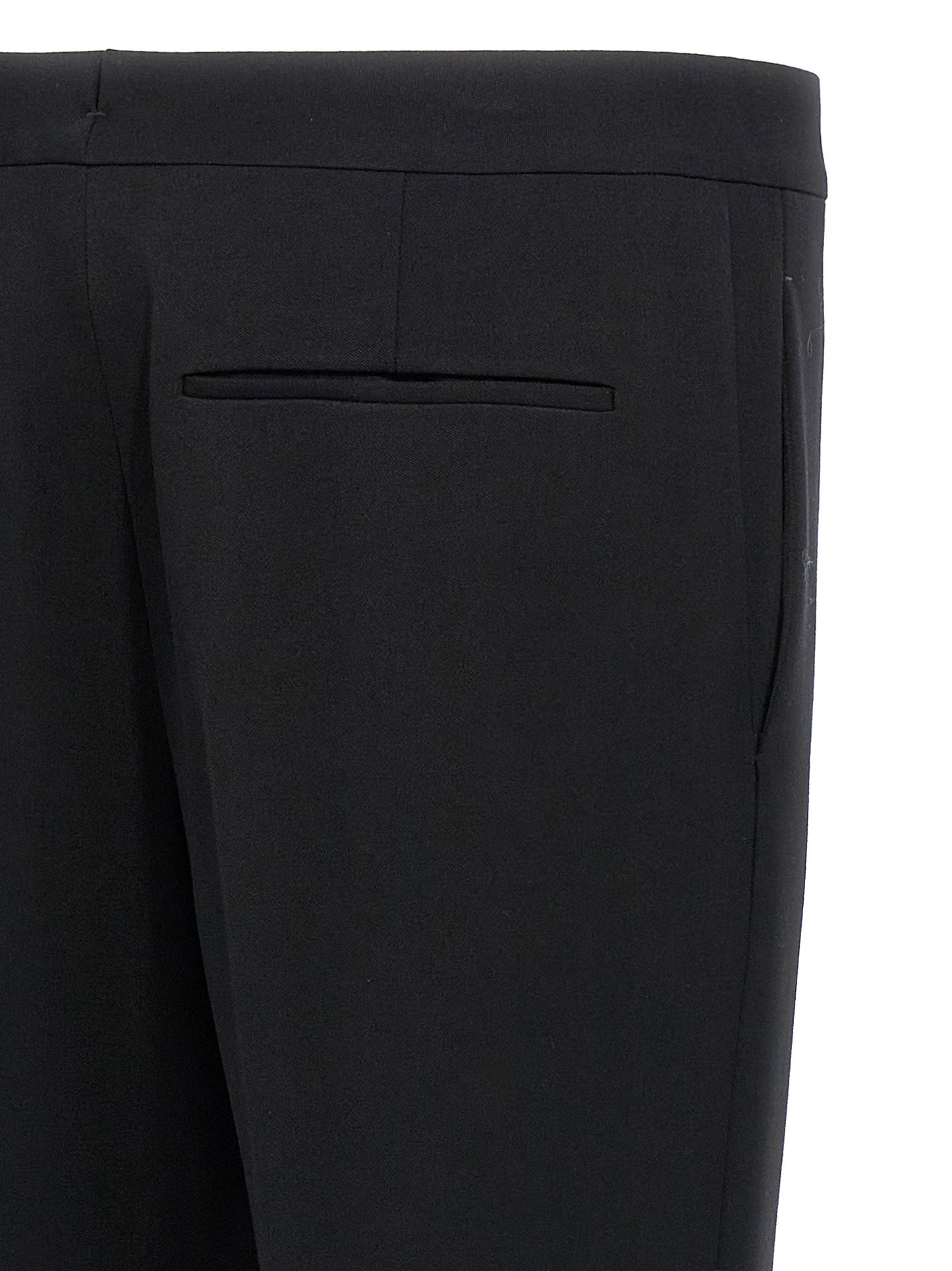 Trousers by Saint Laurent for men in wool black features an on trend silhouette, showcasing a sophisticated with a long and for an on trend finish.