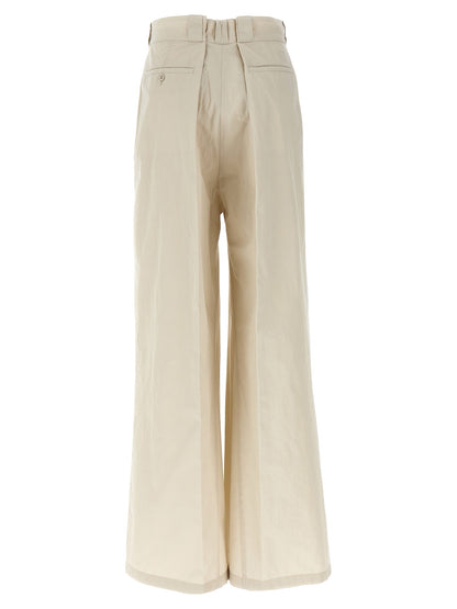 Casual Pants by Maison Margiela for women in polyamide cotton beige features an sophisticated and wide with a precise long, creating a sophisticated and sophisticated silhouette.