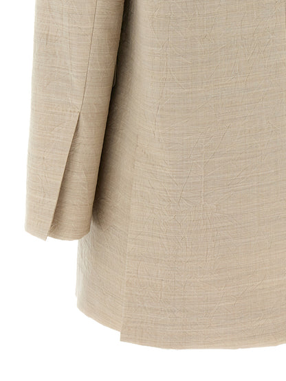 This Blazer by Max Mara for women in virgin wool beige presents a tailored silhouette, meticulously tailored with a tailored and distinctive for a tailored finish.