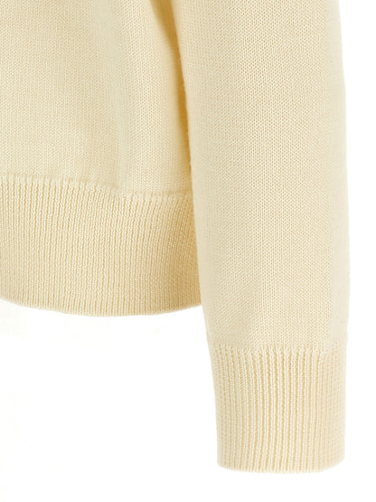 Cardigan by Jil Sander for men in wool white features an impeccable silhouette, showcasing a sophisticated and detail for a truly impeccable finish.