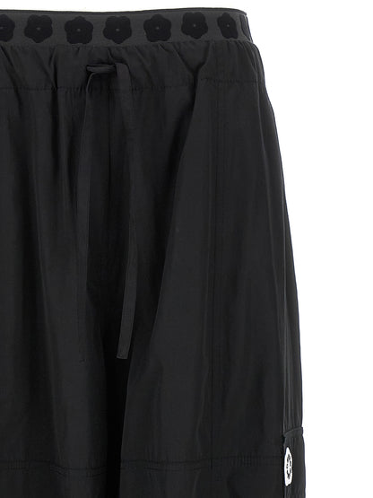 Cargo Pants by Kenzo for women in cotton polyester black features an stylish with a long and , expertly finished with stylish utility detailing.