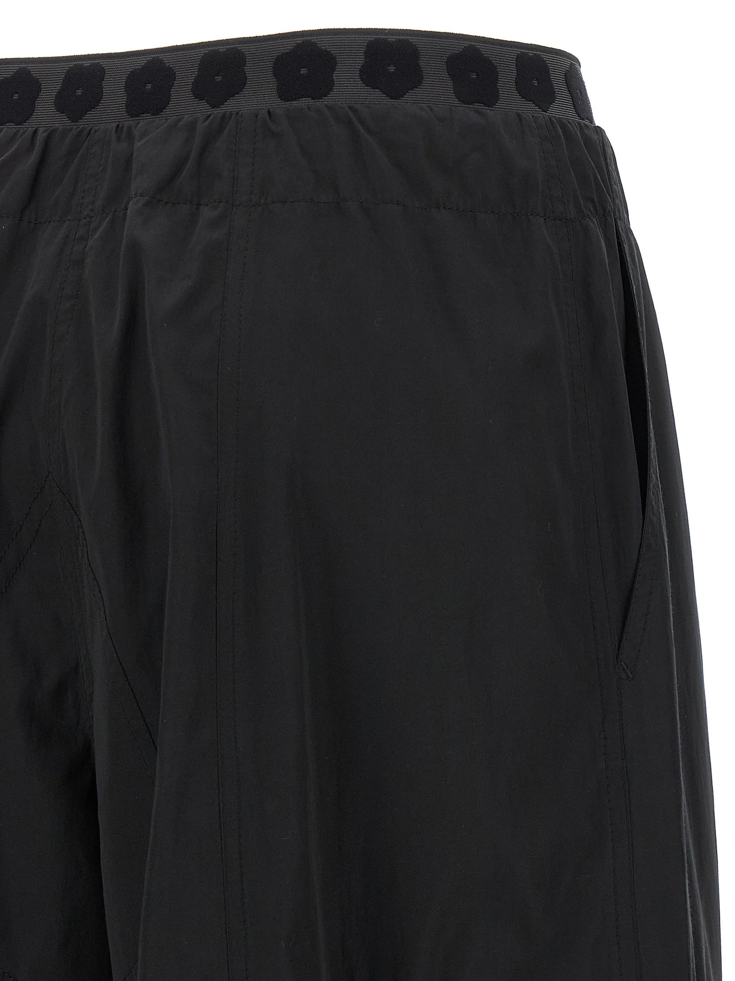 Cargo Pants by Kenzo for women in cotton polyester black presents a on trend silhouette, artfully finished with a on trend , long, and for a sophisticated look.