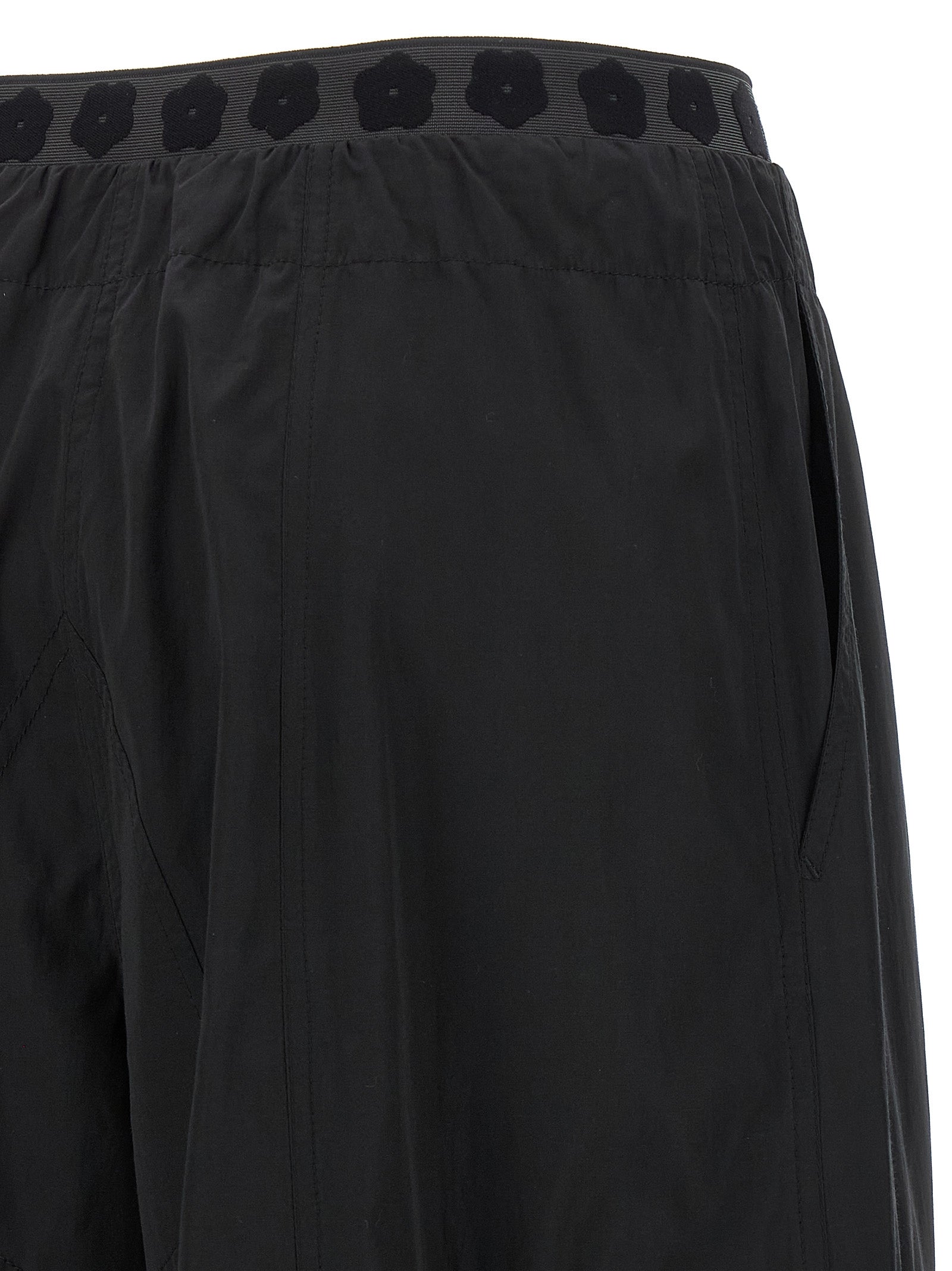 Cargo Pants by Kenzo for women in cotton polyester black presents a on trend silhouette, artfully finished with a on trend , long, and for a sophisticated look.
