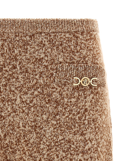 Skirt by Versace for women in cashmere virgin wool gold & multicolor features a captivating silhouette, showcasing the captivating Women's Cashmere Virgin Wool Mini Long Skirt design with a sophisticated mini long for a captivating look.