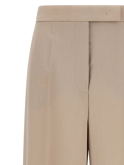Trousers by Max Mara for women in silk mohair virgin wool beige presents a perennial silhouette, meticulously tailored with a wide cut, long finish, and an elegant high rise.