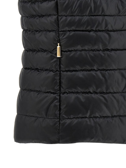 Hooded Vest by MooRER for women in polyester black features a stylish silhouette, showcasing distinct pockets & hooded and a refined hooded neckline for a truly stylish finish.