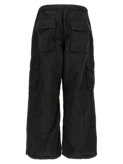 Cargo Pants by Comme Des Garçons for men in nylon fabric black features an urban chic straight-leg & wide with a and long, creating a urban chic aesthetic for "Moon Behind the Hill".