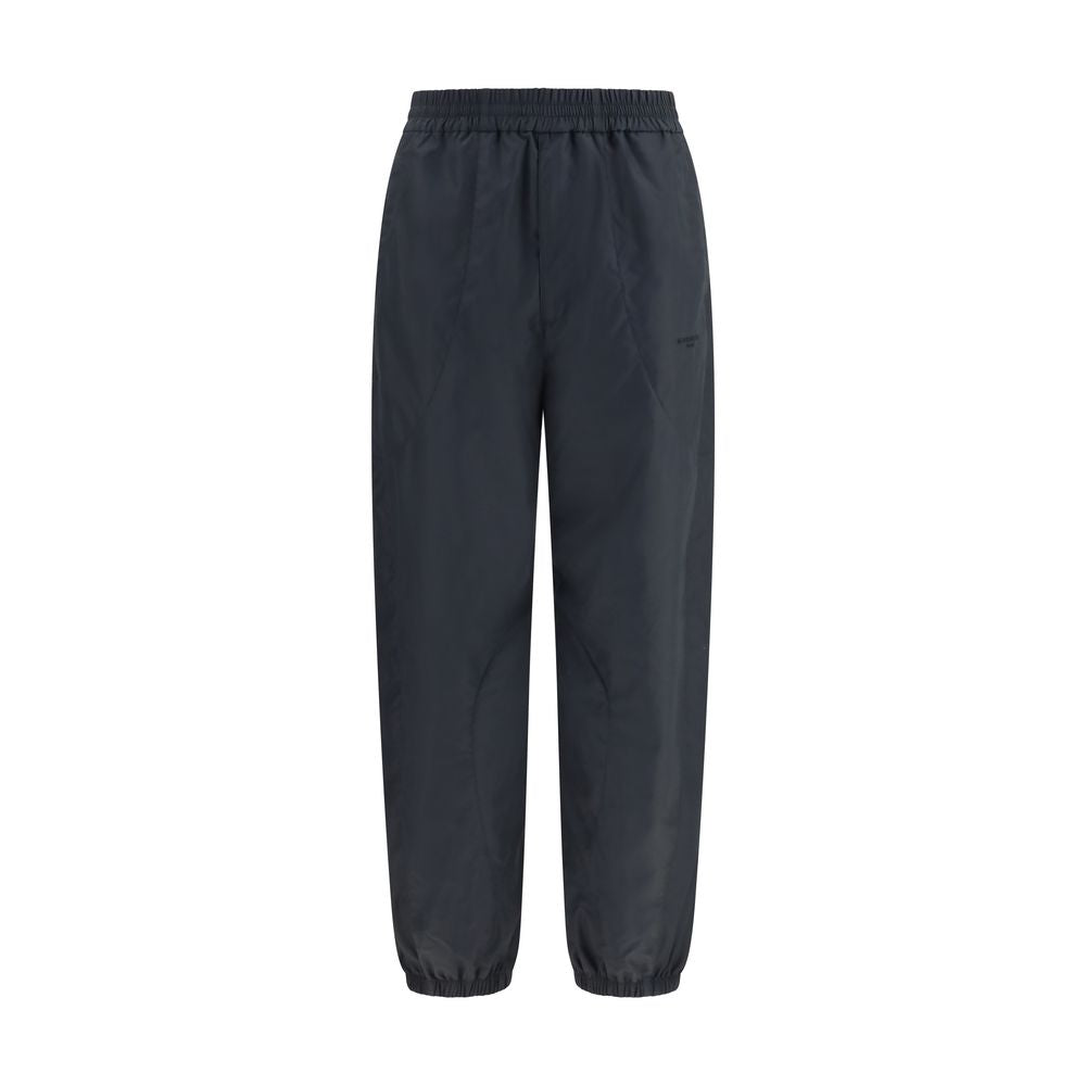 Joggers by Givenchy for men in cotton polyester black & signature features a refined silhouette with a refined relaxed-fit & regular-fit, defined by a and a refined long for a refined finish.