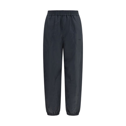 Joggers by Givenchy for men in cotton polyester black & signature features a refined silhouette with a refined relaxed-fit & regular-fit, defined by a and a refined long for a refined finish.