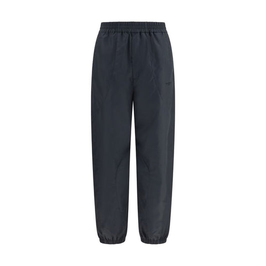 Joggers by Givenchy for men in cotton polyester black & signature features a refined silhouette with a refined relaxed-fit & regular-fit, defined by a and a refined long for a refined finish.