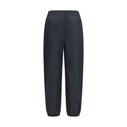 Joggers by Givenchy for men in cotton polyester black & signature features a polished silhouette with a polished relaxed-fit & regular-fit, reaching a polished long and finished with a polished .