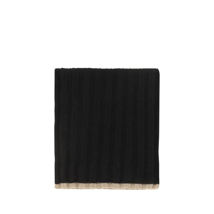 Scarf by Brunello Cucinelli for men in cashmere & capra leather black showcases a warm silhouette from the Cashmere & Capra Leather Scarf collection, offering a warm drape that exudes sophisticated luxury.