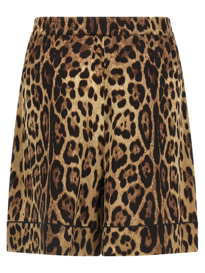 Bermuda Shorts by Dolce & Gabbana for women in silk black, brown, leopard-print & print features an tailored silhouette, showcasing a tailored with a short and for a sophisticated look.