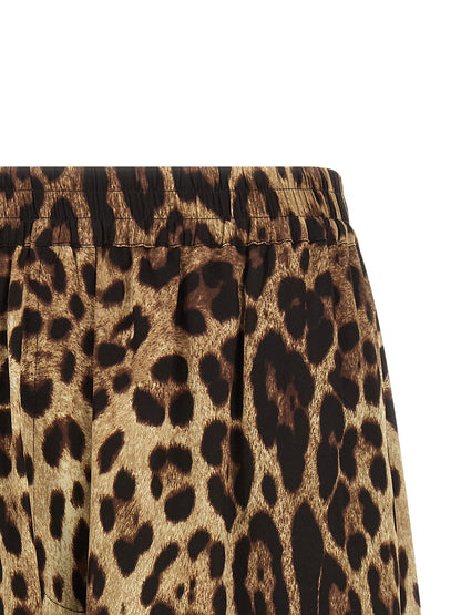 Bermuda Shorts by Dolce & Gabbana for women in silk black, brown, leopard-print & print presents a sleek silhouette, featuring a sleek with a refined short and a sophisticated .