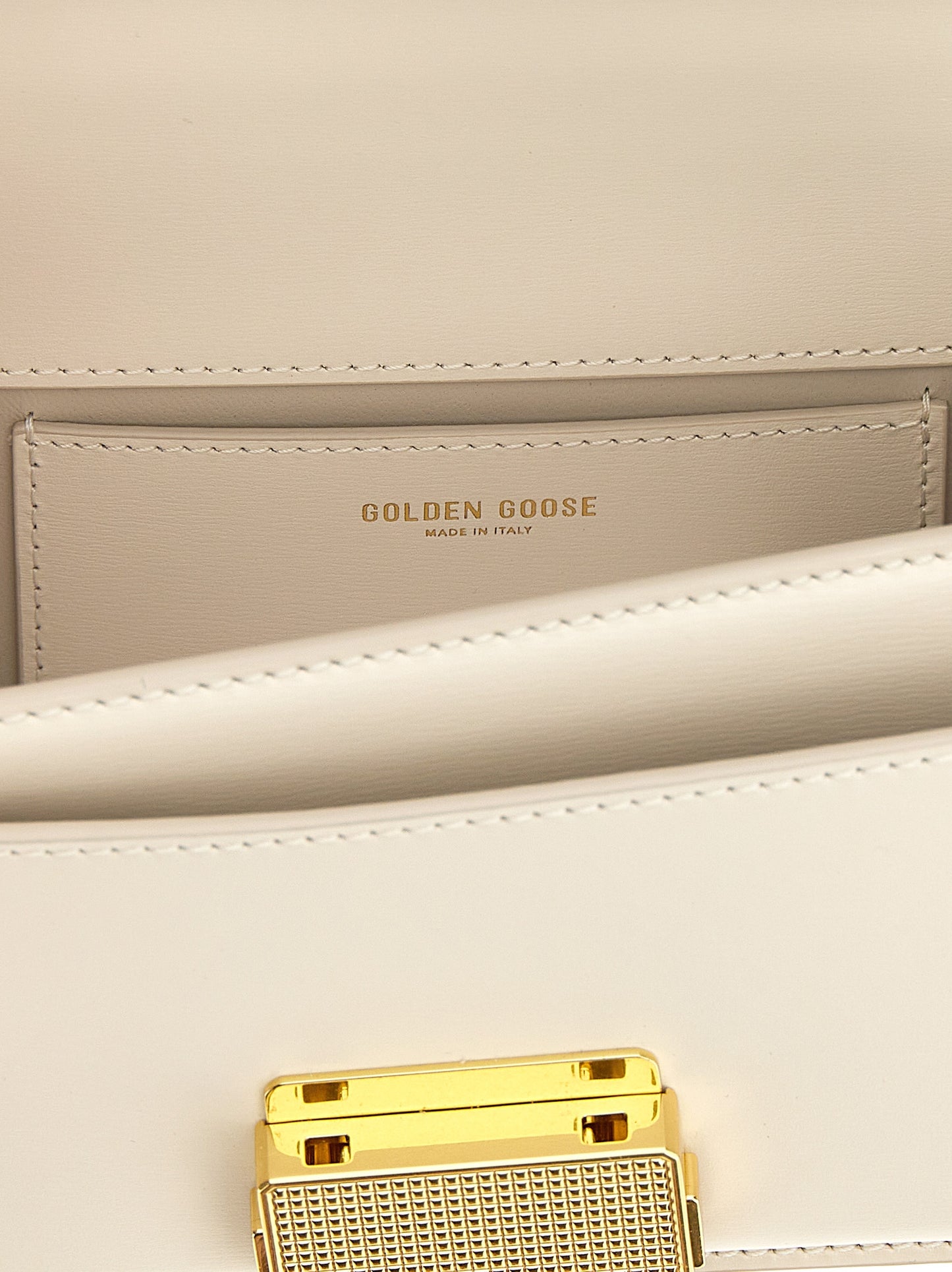 Small Handbag by Golden Goose for women in leather & metal white features an refined silhouette, showcasing a secure clip, ample , and versatile shoulder-strap, handle & adjustable-strap for a sophisticated refined aesthetic.