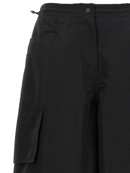 Casual Pants by Palm Angels for women in nylon & polyester black features an sartorial and long with a cut for a sartorial finish.