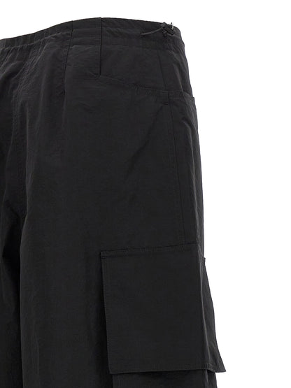 Casual Pants by Palm Angels for women in nylon & polyester black features an refined tailoring silhouette, showcasing a premium with a and long cut for a refined tailoring look.