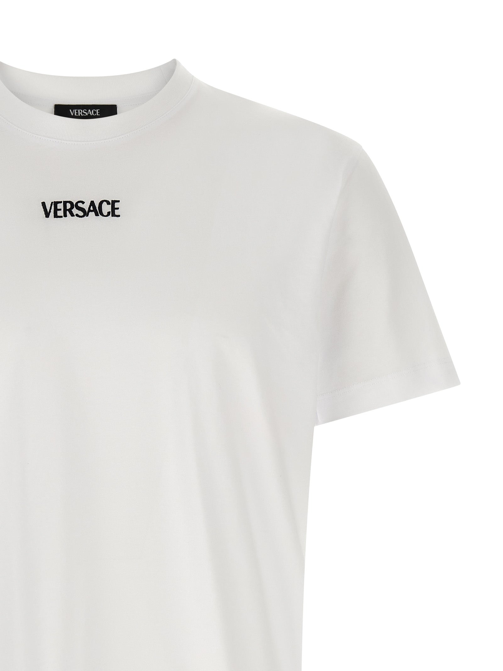 T-Shirt by Versace for men in cotton canvas white showcases a unassuming silhouette, artfully detailed with a refined crew neckline and unassuming for a sophisticated, contemporary look.