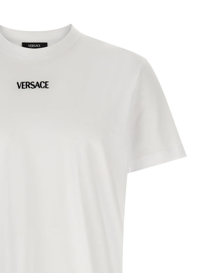 T-Shirt by Versace for men in cotton canvas white showcases a unassuming silhouette, artfully detailed with a refined crew neckline and unassuming for a sophisticated, contemporary look.