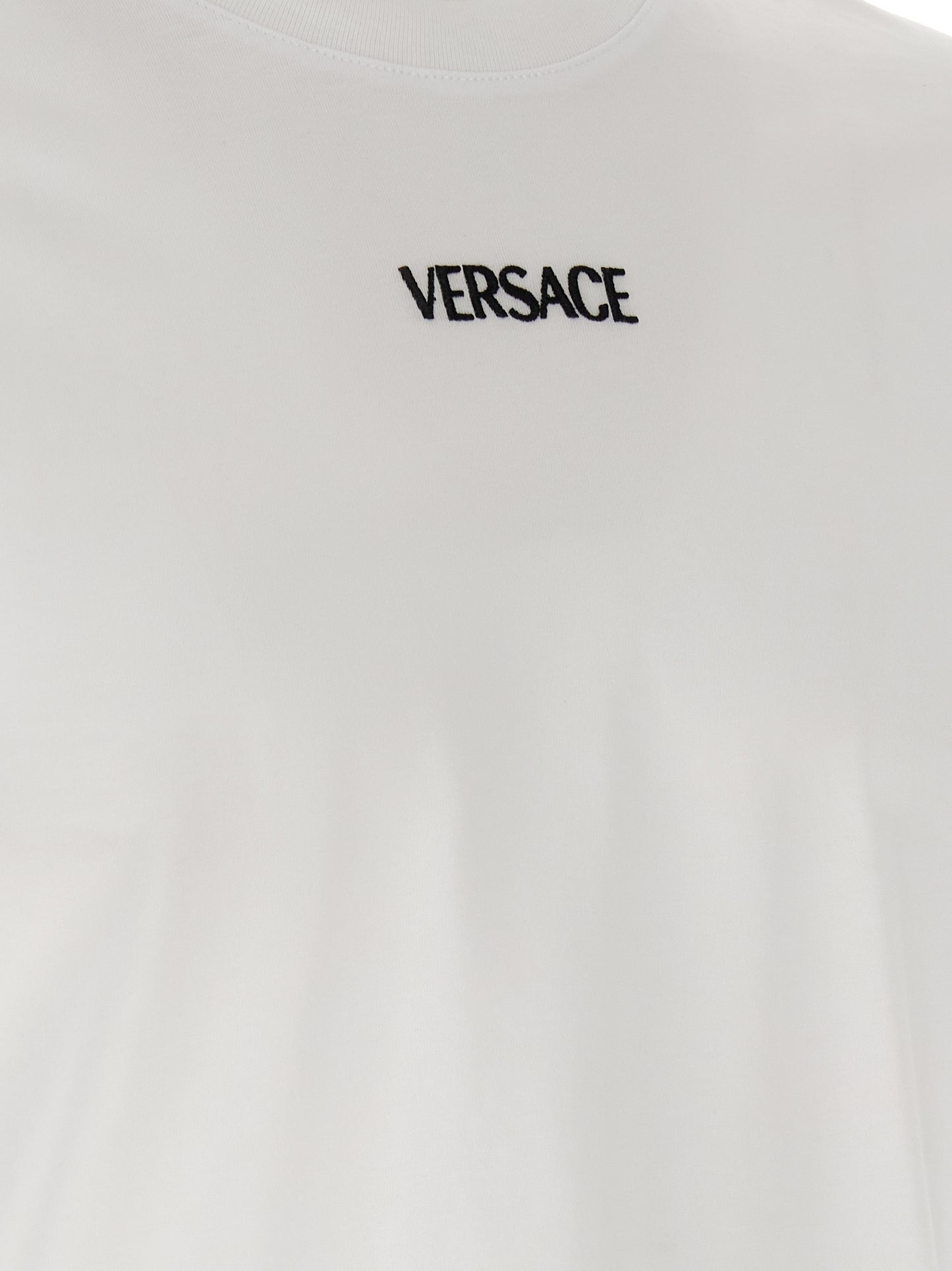 T-Shirt by Versace for men in cotton canvas white showcases a dramatic silhouette, elegantly detailed with a dramatic and for a truly dramatic finish.