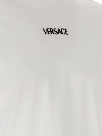 T-Shirt by Versace for men in cotton canvas white showcases a dramatic silhouette, elegantly detailed with a dramatic and for a truly dramatic finish.