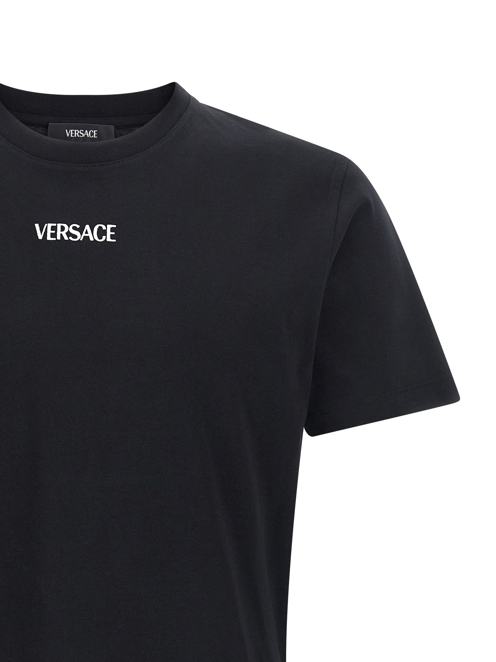 T-Shirt by Versace for men in cotton black showcases a unassuming silhouette, artfully detailed with a refined crew neckline and unassuming for a sophisticated, contemporary look.