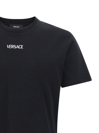 T-Shirt by Versace for men in cotton black showcases a unassuming silhouette, artfully detailed with a refined crew neckline and unassuming for a sophisticated, contemporary look.