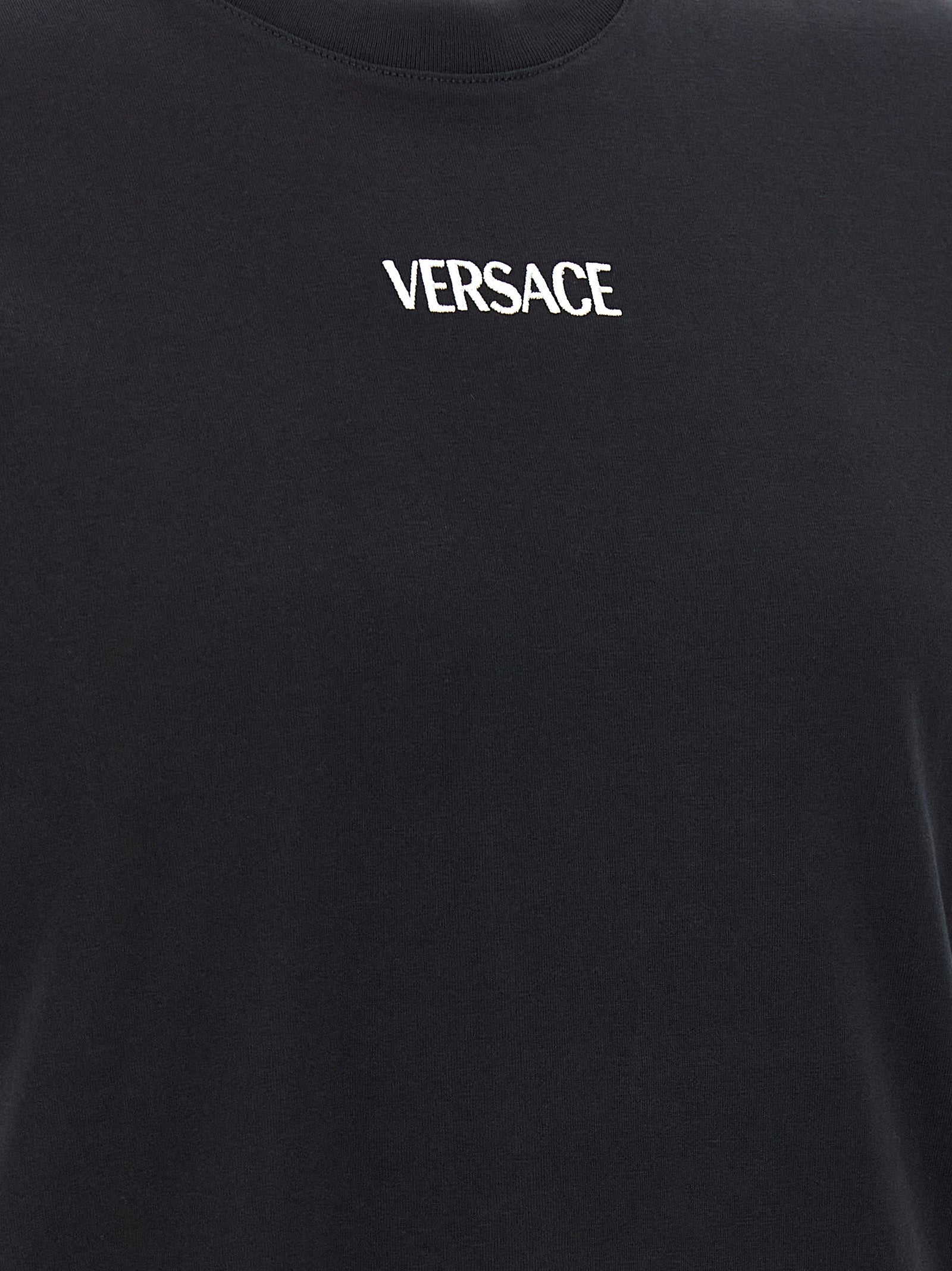 T-Shirt by Versace for men in cotton black showcases a chic silhouette, artfully detailed with a chic and for a chic finish.