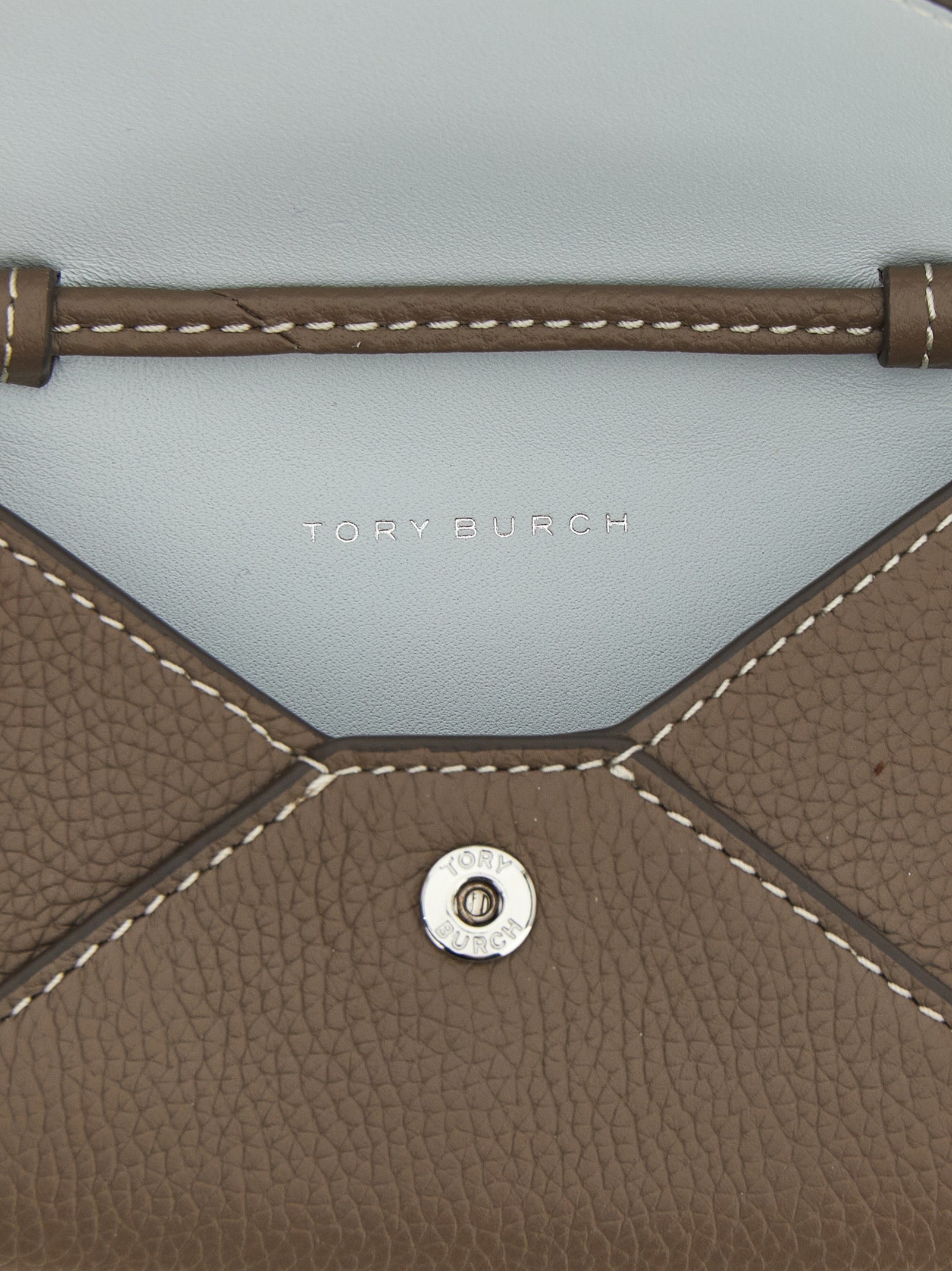 Cardholder Card Case by Tory Burch for women in bos taurus calf suede leather brown features a sleek silhouette, showcasing the sleek design of the Bos Taurus Calf Suede Leather Cardholder Card Case with functional card-organization for a premium look.