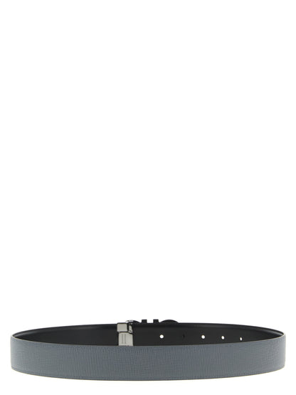 Belt by Ferragamo for men in calfskin leather black & gray presents a artisanal silhouette from the Gancini Calfskin Leather Belt collection, showcasing an artisanal design and refined craftsmanship for a artisanal look.
