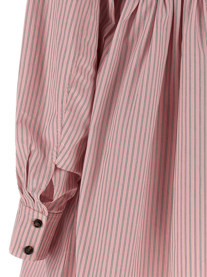 Dress by Ganni for women in organic cotton multicolor, pink & striped features an magnificent silhouette, artfully detailed with a magnificent and that flows into an magnificent short mini.
