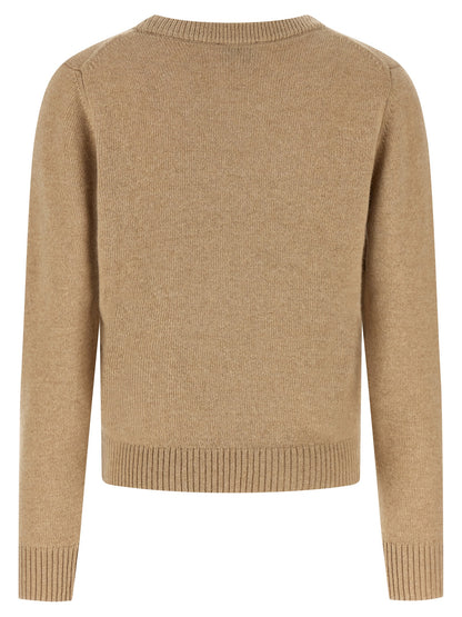 Cardigan by Ganni for women in polyamide wool beige presents a textural silhouette, artfully finished with a textural crew neckline and for a sophisticated, textural look.