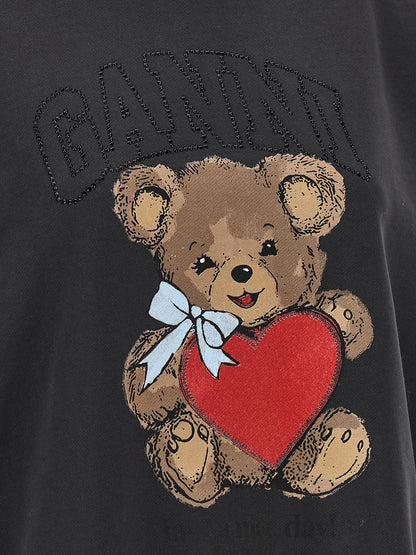 Sweatshirt by Ganni for women in organic cotton & rhinestone black & print features an provocated silhouette, detailed with a provocated and a refined for a sophisticated aesthetic.