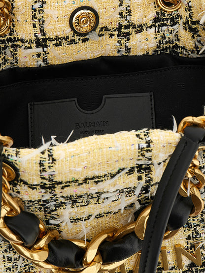 Small Shopper Tote Bag by Balmain for women in poly suede leather & cotton multicolor features an jet-set-ready silhouette, showcasing the Cabas Poly Suede Leather & Cotton Small Shopper Tote Bag design with a secure magnetic, ample , and versatile handle.