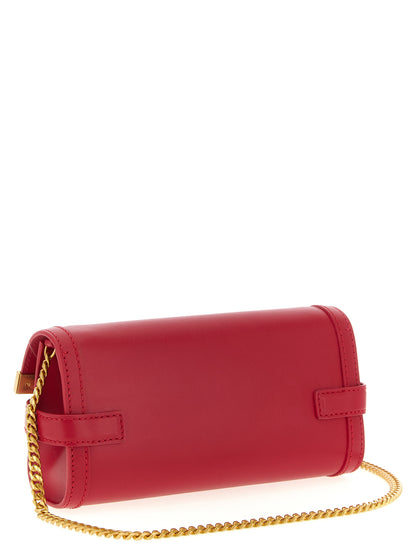 Clutch Handbag by Balmain for women in calfskin leather fuchsia showcases a sculptural silhouette, featuring a secure , ample , and versatile shoulder-strap for a sculptural aesthetic.