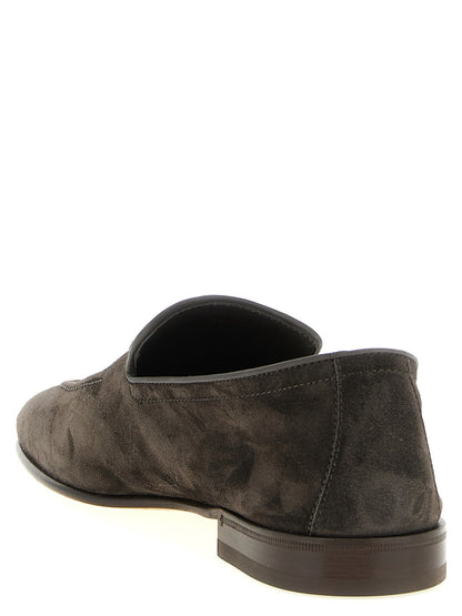This Loafer Slip-On Shoes by Brunello Cucinelli for men in tu & calfskin leather gray features an exquisite silhouette from the Men's TU & Calfskin Leather Loafer Slip-On Shoes collection, defined by a sophisticated and elegant almond toe style.