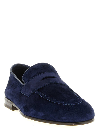 This Loafer Slip-On Shoes by Brunello Cucinelli for men in tu & calfskin suede leather blue features an exquisite silhouette from the Men's TU & Calfskin Suede Leather Loafer Slip-On Shoes collection, defined by a sophisticated and elegant almond toe style.