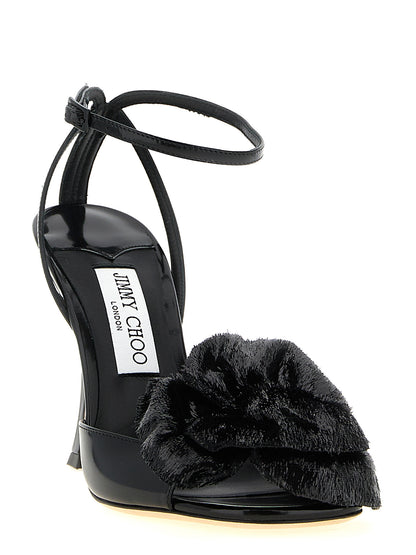 Stiletto Spool Ankle Strap Sandals by Jimmy Choo for women in leather black features an exquisite silhouette, showcasing the exquisite Women's Leather Stiletto Spool Ankle Strap Sandals with a stiletto spool-heel and .