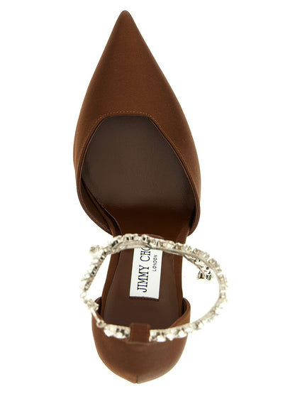 This High-Heel Spool Pumps Heels by Jimmy Choo for women in patent cowhide leather brown presents a effortlessly chic silhouette from the Women's Patent Cowhide Leather High-Heel Spool Pumps Heels collection, featuring a effortlessly chic high-heel spool-heel and effortlessly chic pointed toe style.