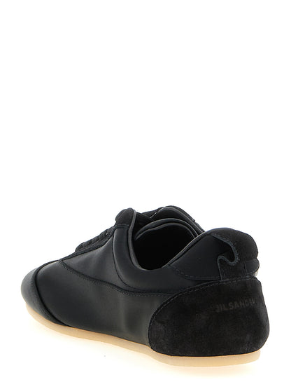 Sneakers by Jil Sander for women in cotton satin polyamide suede leather black presents a impeccable silhouette as Women's Low Top Cotton Satin Polyamide Suede Leather Sneakers, expertly defined by a impeccable low-top style for a impeccable, high-fashion look.