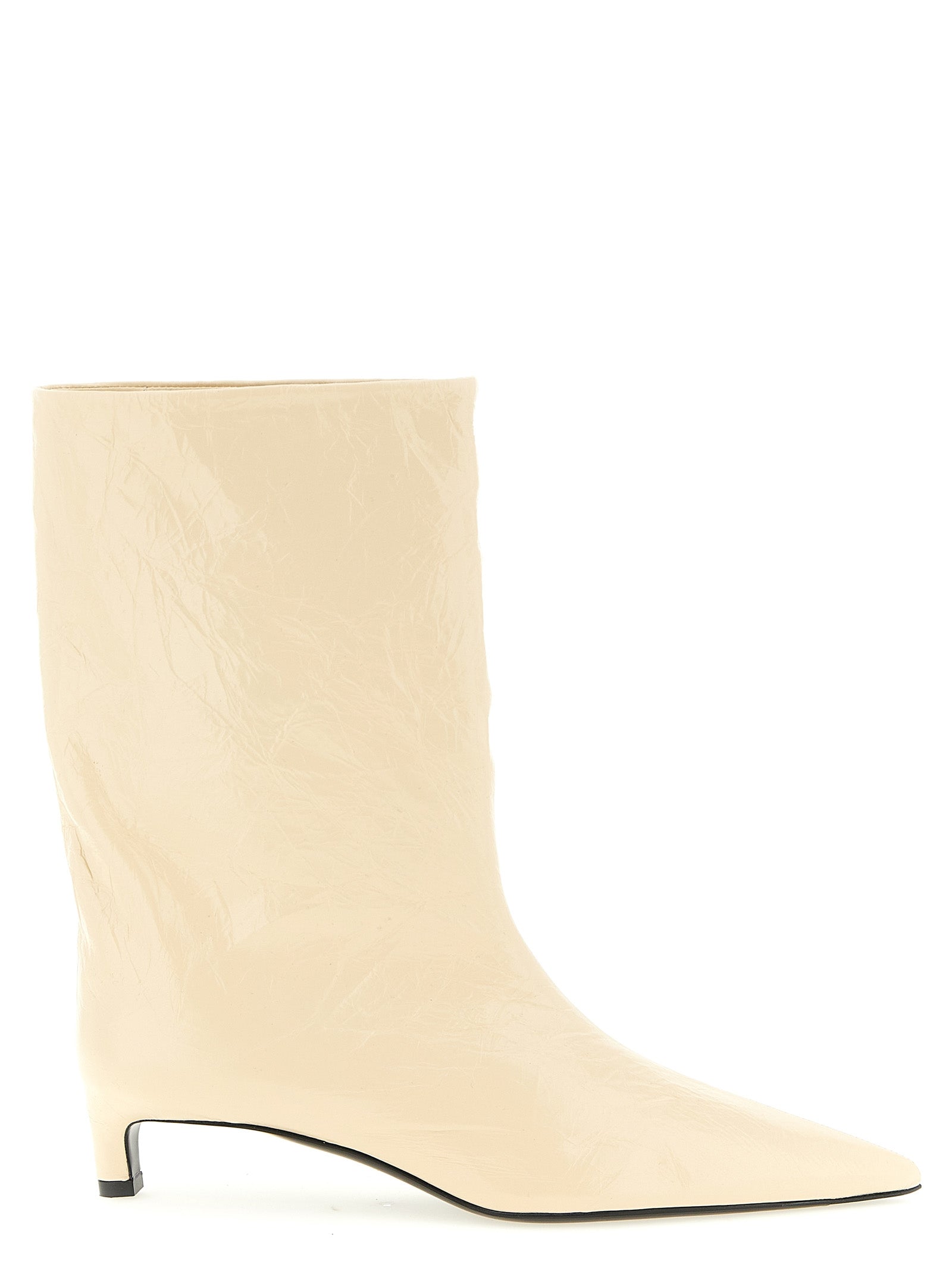 Ankle Boots by Jil Sander for women in calfskin leather beige showcases a impeccable silhouette as Women's Calfskin Leather Ankle Boots, artfully defined by a impeccable and a impeccable pointed toe style.