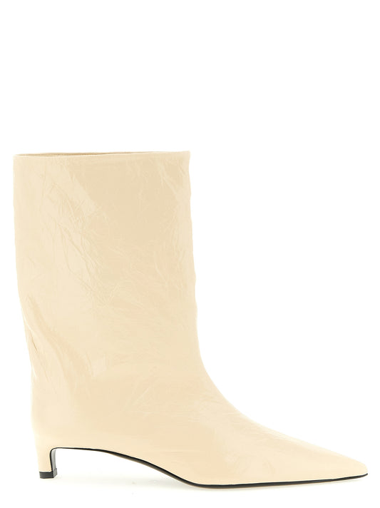 Ankle Boots by Jil Sander for women in calfskin leather beige showcases a impeccable silhouette as Women's Calfskin Leather Ankle Boots, artfully defined by a impeccable and a impeccable pointed toe style.