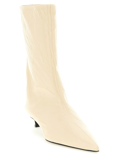 Ankle Boots by Jil Sander for women in calfskin leather beige features an avant-garde Women's Calfskin Leather Ankle Boots silhouette, defined by a sophisticated and a avant-garde pointed toe style.