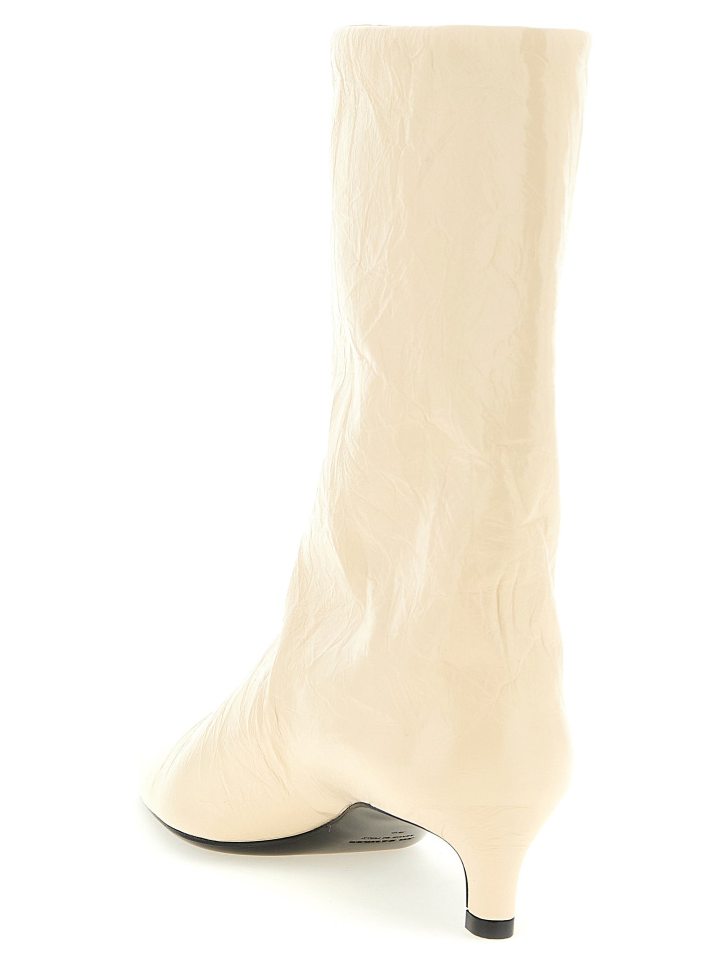 Ankle Boots by Jil Sander for women in calfskin leather beige features an high-performance silhouette, showcasing the sophisticated design of the Women's Calfskin Leather Ankle Boots with a and a refined pointed toe style.